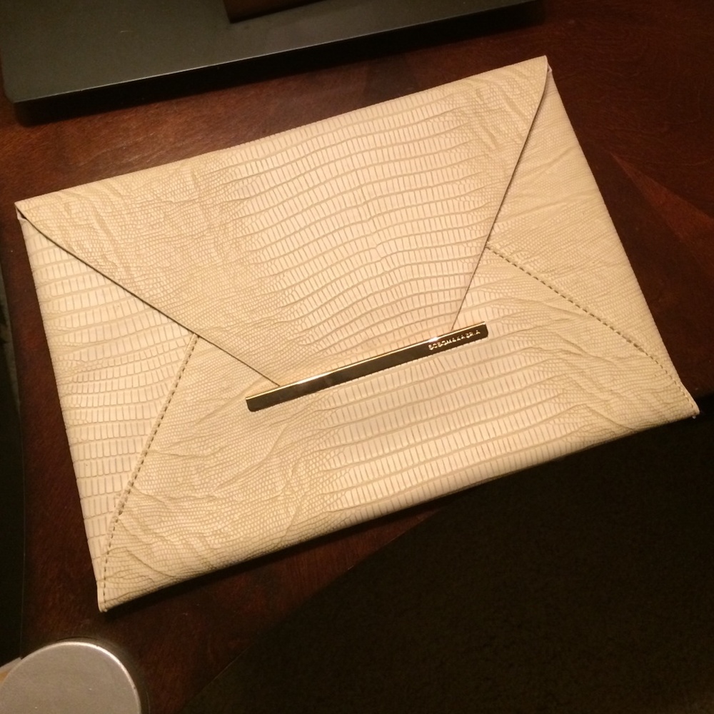 BCBG Maxazria envelope tan/gold clutch